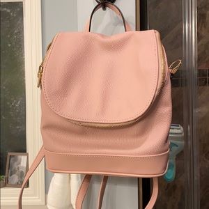 Pale pink backpack or crossbody purse